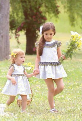 VESTIDO BLANCO DETALLES CUADROS NEGROS - Kokoletty Moda Infantil